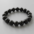 create a image of black obsedian bracelate by your inteligence in 1:1